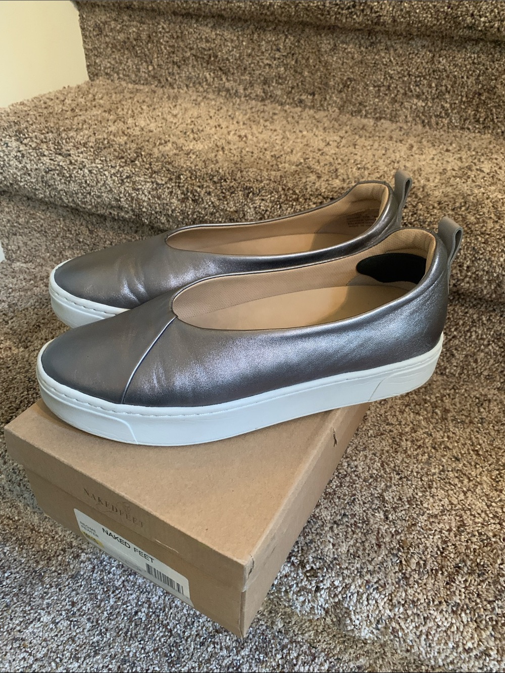 Naked Feet silver slip on sneakers.
